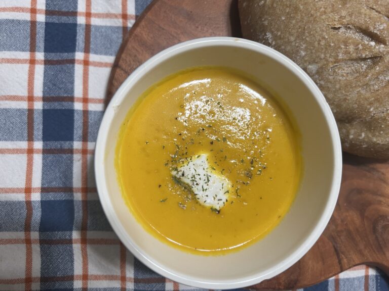 Creamy Carrot Soup, perfect to warm up on a blustery day in the fall.